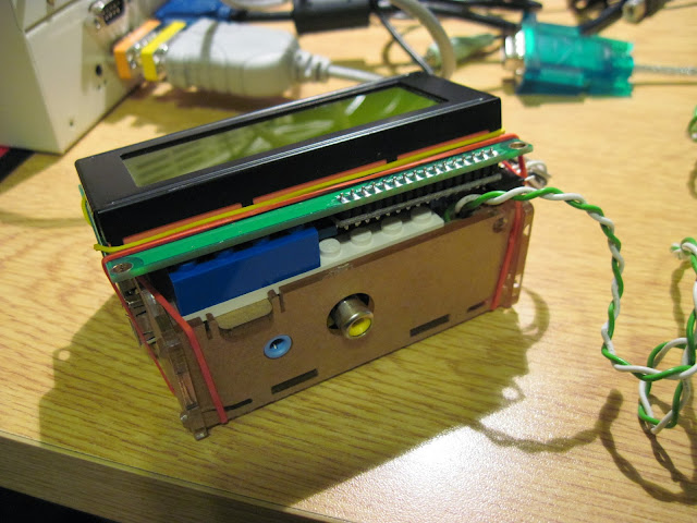 R-Pi, back side view, a bit of creativity with a Lego (C) block supporting the LCD screen.