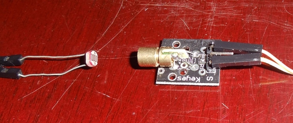 Raspberry Pi Arduino a laser pointer communication and a LDR voltage sigmoid