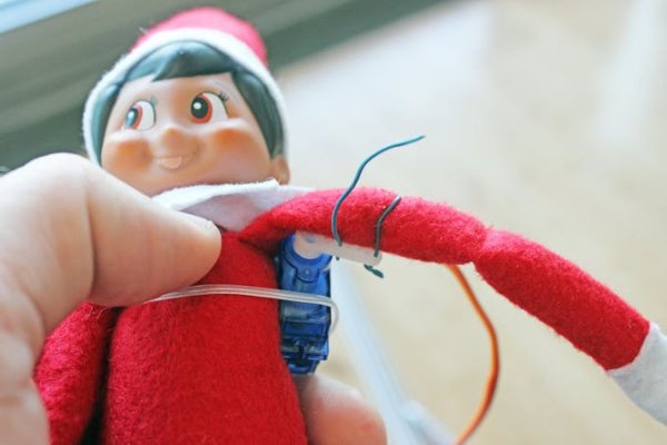 elf-servo_mounted_to_the_arm_controlled-by-a-raspberry-pi