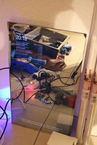 testing mirror with monitor in back