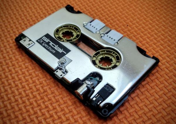 This tape cassette is actually a full-fledged computer (powered by a Raspberry Pi Zero W)