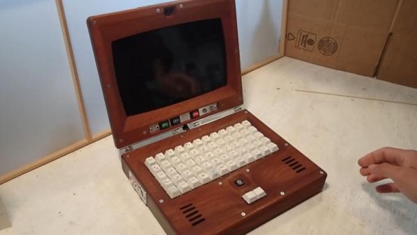 THE COMPU-TOR IS A RASPBERRY PI LAPTOP IN A MAHOGANY CASE