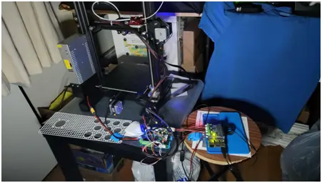 Raspberry Pi with Stepper Motor HATs 3D printer Setup. The Raspberry Pi is in the bottom right